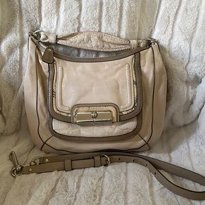 Coach bag with crossbody strap.